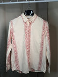 white and red patterned long-sleeve shirt