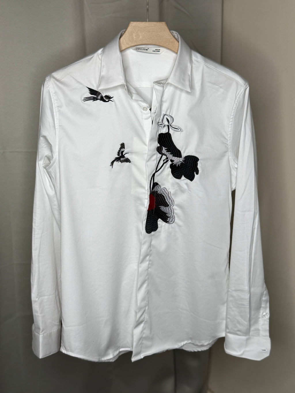 white embroidered printed shirt
